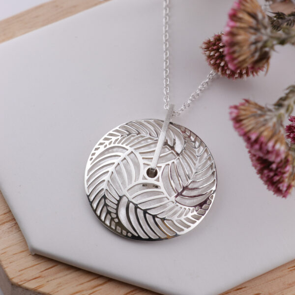 Sterling Silver Domed Leaf Spinner Pendant – Kinetic