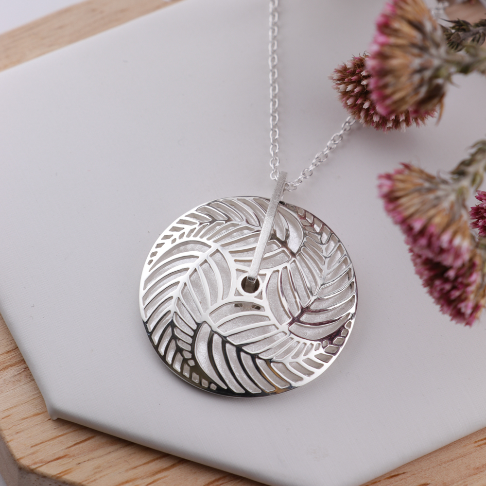 Sterling Silver Domed Leaf Spinner Pendant – Kinetic