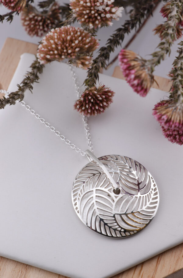 Sterling Silver Domed Leaf Spinner Pendant – Kinetic